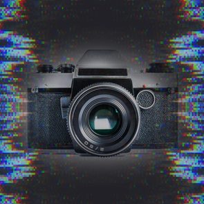 Retro film photo camera isolated on white background; Shutterstock ID 528068158