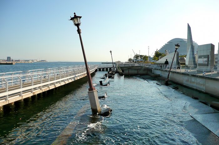 A view of the Kobe Earthquake Memorial Park, where a piece of the harbor is being left untouched in its wrecked state.