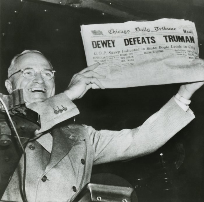 Harry S. Truman, president-elect, holds up edition of Chicago Daily Tribune with headline Dewey Defeats Truman. The Republican newspaper followed the public polls predictions that Truman would be defeated by Dewey. Instead, Truman won with electoral votes to spare and a 49.6 % of the popular vote to Deweys 45.1 %. Nov. 3, 1948. - Historical Collection