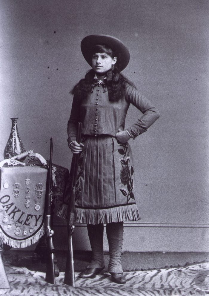Annie OAKLEY, 1860-1936, Wild West Show cowgirl called "Little Sure Shot" c. 1885