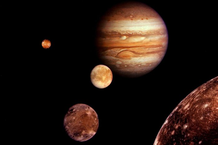 Jupiter and Its Four Planet- Size Moons - Collage of Images From Voyager I Taken in March 1979 Europa (centre) Ganymede and Callisto (lower Right) and Io (upper Left)