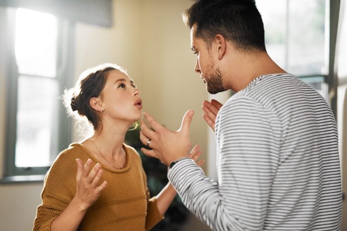 Cropped shot of a young couple having an argument at home