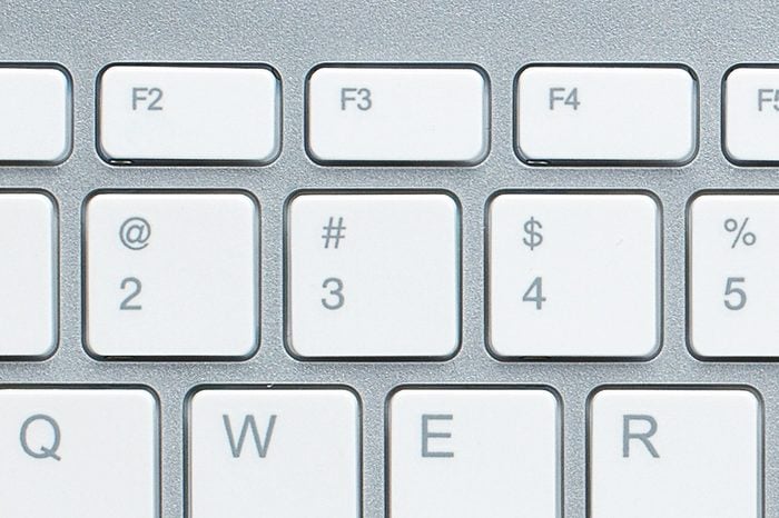 close up of computer keyboard. 2 ampersand, 3 pound, 4 dollar sign, 5 percent