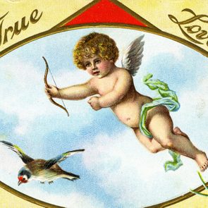 vintage Valentine postcard with cupid