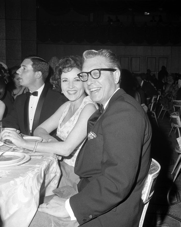 American TV personality Allen Ludden (1917 - 1981) and his wife, actress Betty White, at the 18th Emmy Awards, at the Hollywood Palladium, Los Angeles, 22nd May 1966.
