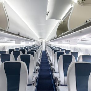 Interior of a large empty commercial passenger aircraft.