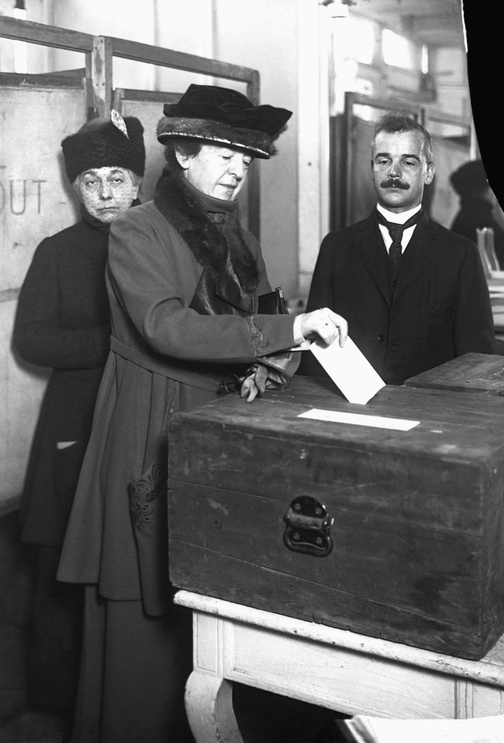 maud powell places ballot into ballot box voting