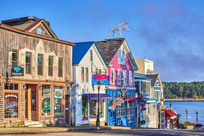 Old Wooden store buildings on waterfront at the town of Bar Harbor in Acadia national Park, Maine, USA