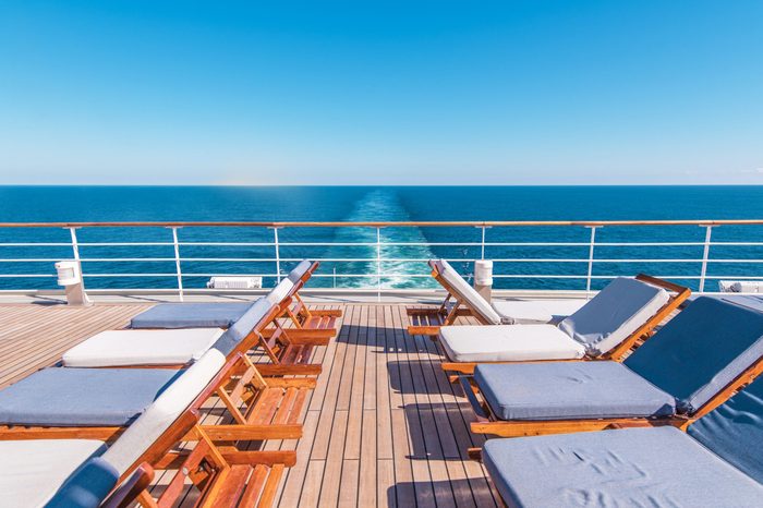 cruise ship at sea. desk with lounge chairs.