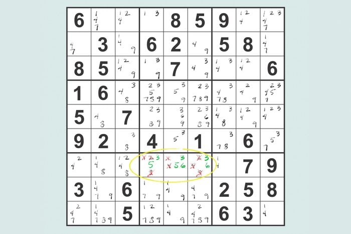 sudoku grid highlighting a found hidden triple in the pencil markings