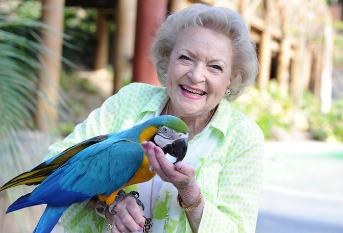 ctress Betty White holding a parrot at the Greater Los Angeles Zoo Association's (GLAZA) 44th Annual Beastly Ball at Los Angeles Zoo on June 14, 2014 in Los Angeles, California.