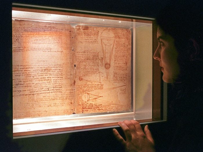 Mandatory Credit: Photo by Richard Drew/AP/Shutterstock (6518428a) GARIPOLI Marisa Garipoli, of New York's American Museum of Natural History, views 2 of 72 pages of Leonardo da Vinci's Codex Leicester on display at the facility, . The manuscript, which is on loan from Bill Gates, covers a wide variety of topics, from astronomy to hydrodynamics and includes Leonardo's observations and theories related to rivers and seas; properties of water; fossils; air; and celestial light LEONARDO'S EXHIBIT, NEW YORK, USA