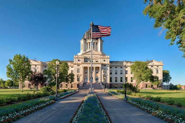 Exterior of the South Dakota State Capitol building on a clear, summer day