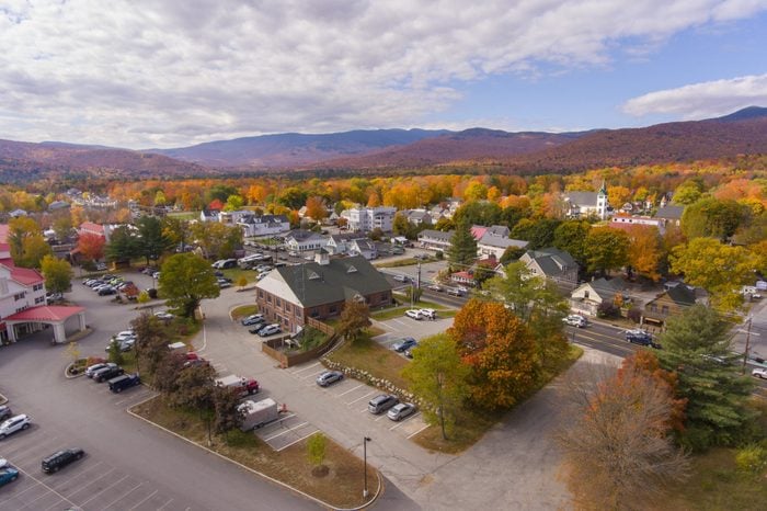 Lincoln town hall at Main Street and Kancamagus Highway aerial view with fall foliage, Town of Lincoln, New Hampshire NH, USA.