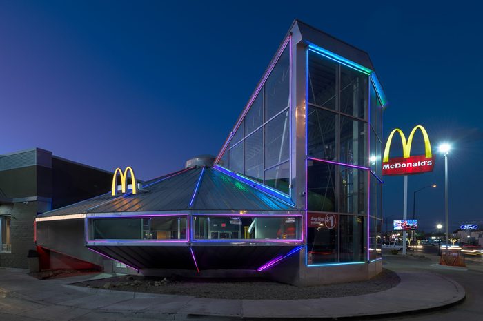 ROSWELL, NEW MEXICO, USA - NOVEMBER 22, 2019: Flying Saucer UFO McDonald's at night on Main Street in downtown Roswell