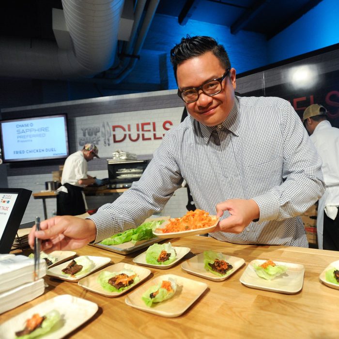 Mandatory Credit: Photo by Evan Agostini/Invision/AP/Shutterstock (9079439f) Chef Dale Talde prepares a Korean short ribs dish at "Top Chef Duels" Premiere Tasting Event, hosted by Chase Sapphire Preferred and Bravo, at the Altman Building, on in New York "Top Chef Duels" Premiere Tasting Event, New York, USA