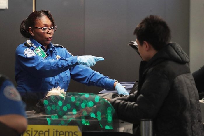 A Transportation Security Administration (TSA) worker screens passengers and airport employees at O'Hare International Airport on January 07, 2019 in Chicago, Illinois.