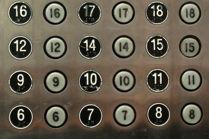 detail of elevator buttons missing the number 13