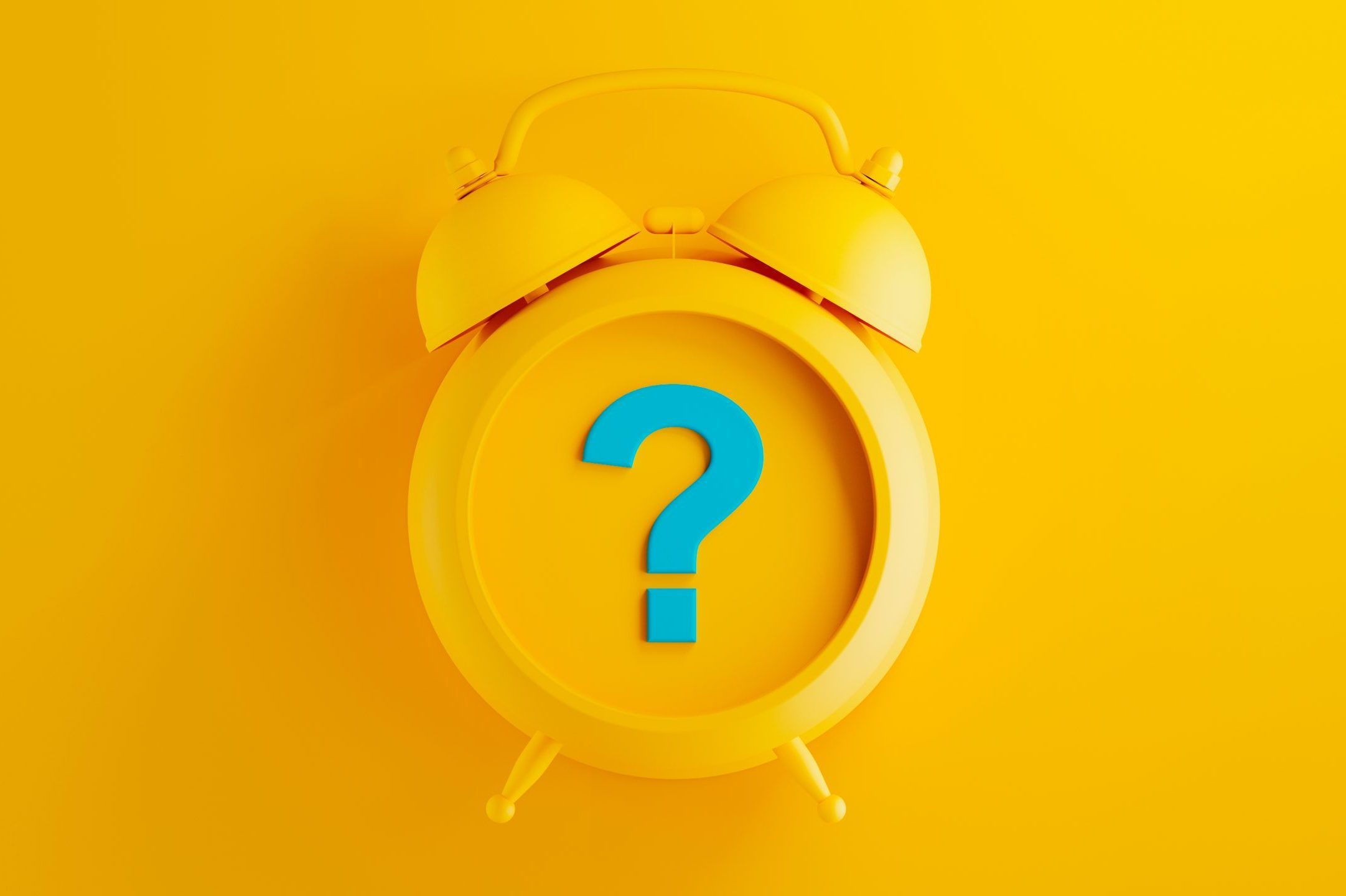 yellow alarm clock on yellow background with blue question mark symbol