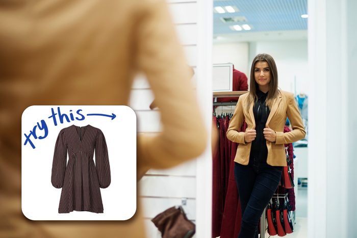woman trying on jacket with inset of dress