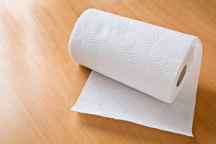 paper towel roll on wood background