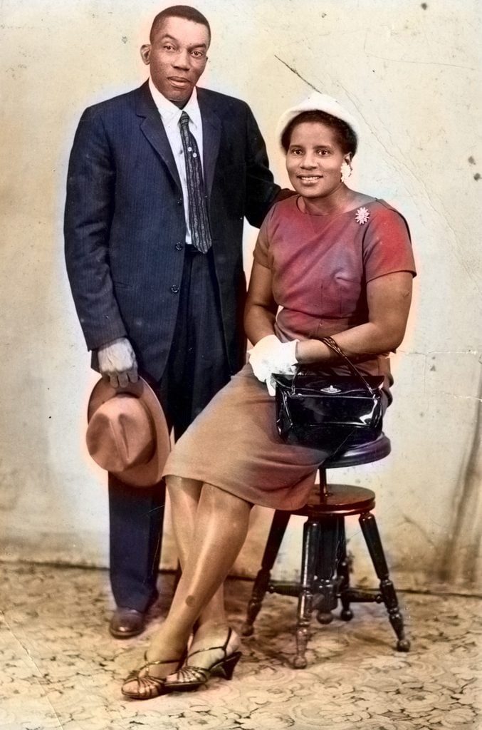 Portrait of African-American couple wearing hat, suit and formal dress, vintage fashion 1920s