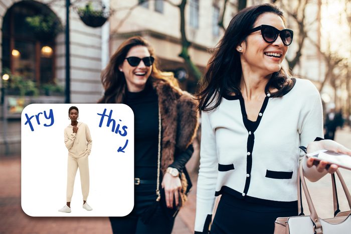 Two Women On City laughing with inset of sweat suit to buy