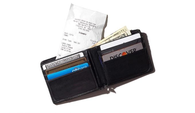 wallet with receipt sticking out