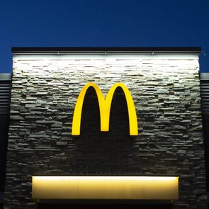 mcdonalds sign on the building at dusk