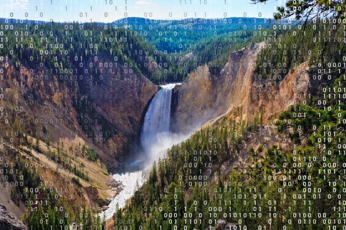 yellowstone grand canyon waterfall with computer code overlay