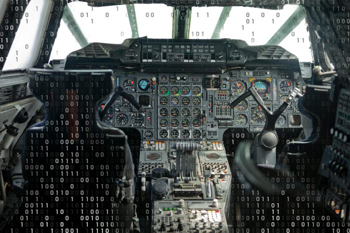 cockpit of the concorde with computer code overlay