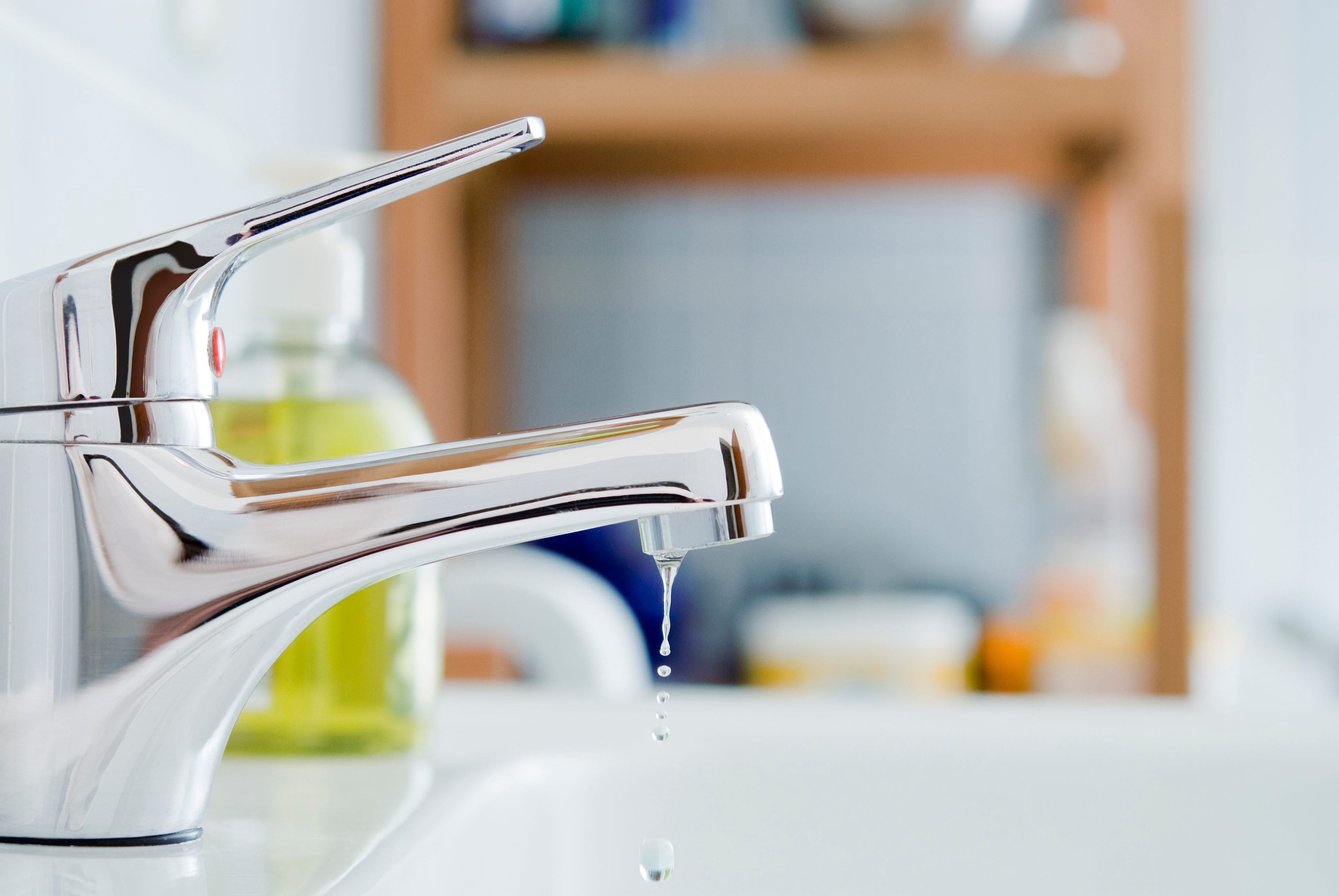 Here's How Much Water a Leaky Faucet Wastes Over Time - Reader's Digest