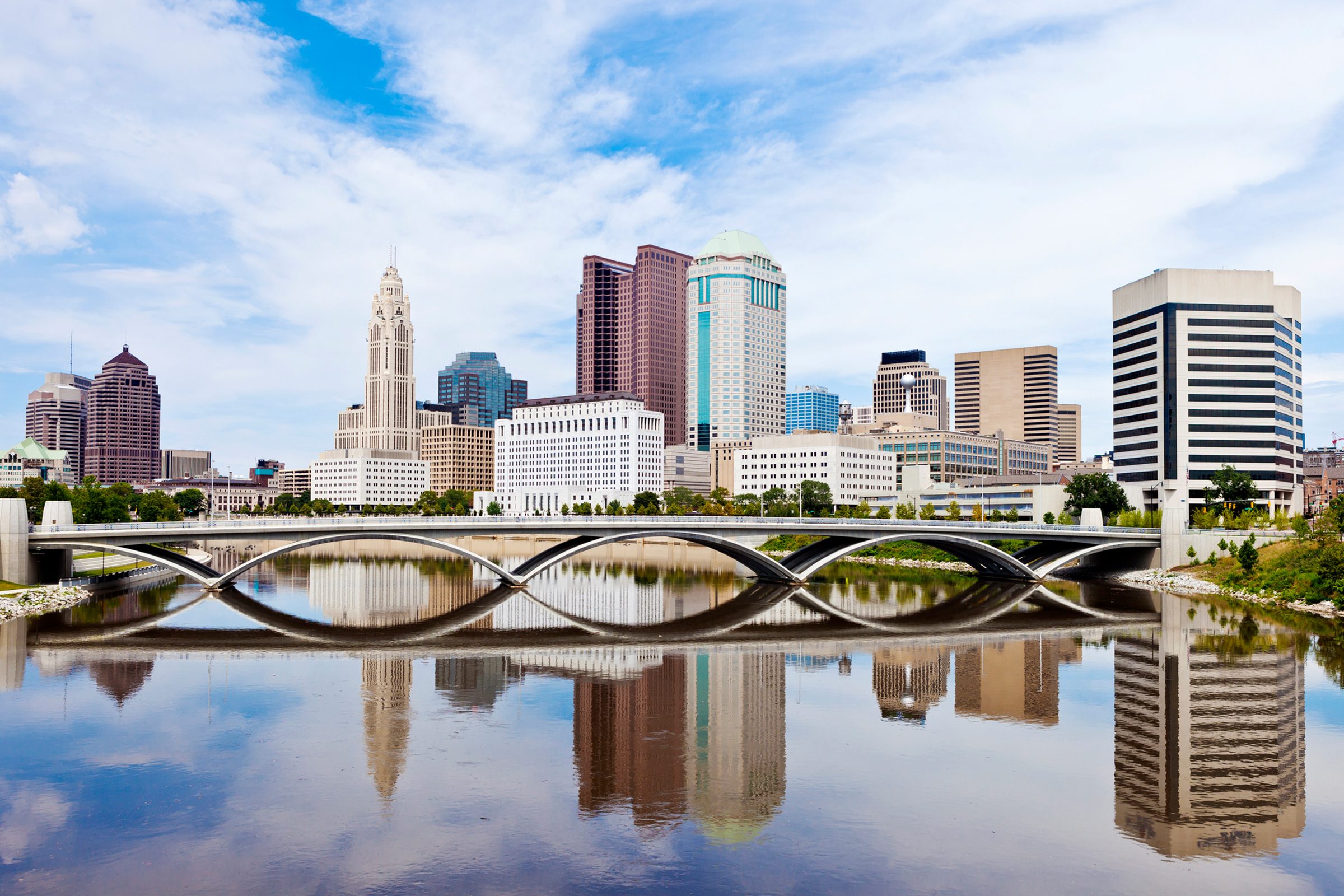 Downtown Columbus, Ohio On A Sunny Summer Day With Reflection In The River