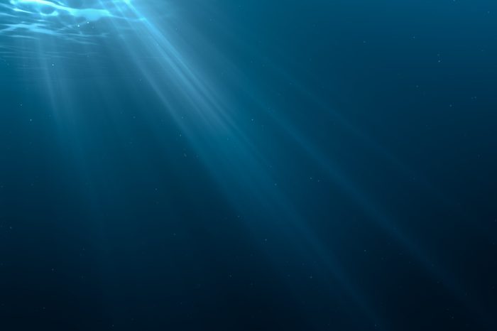 Light rays in underwater scene. 3D rendered illustration.