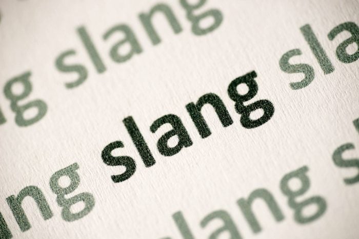 word slang printed on paper macro