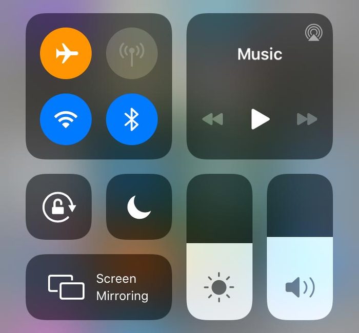 iphone screenshot. control center showing airplane mode active.
