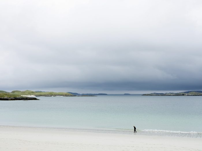 Walking On The Beach On The Outer Hebrides Of Scotland