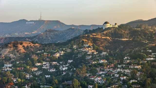 Aerial view of Griffith Observatory with the Hollywood Sign seen in the distance
