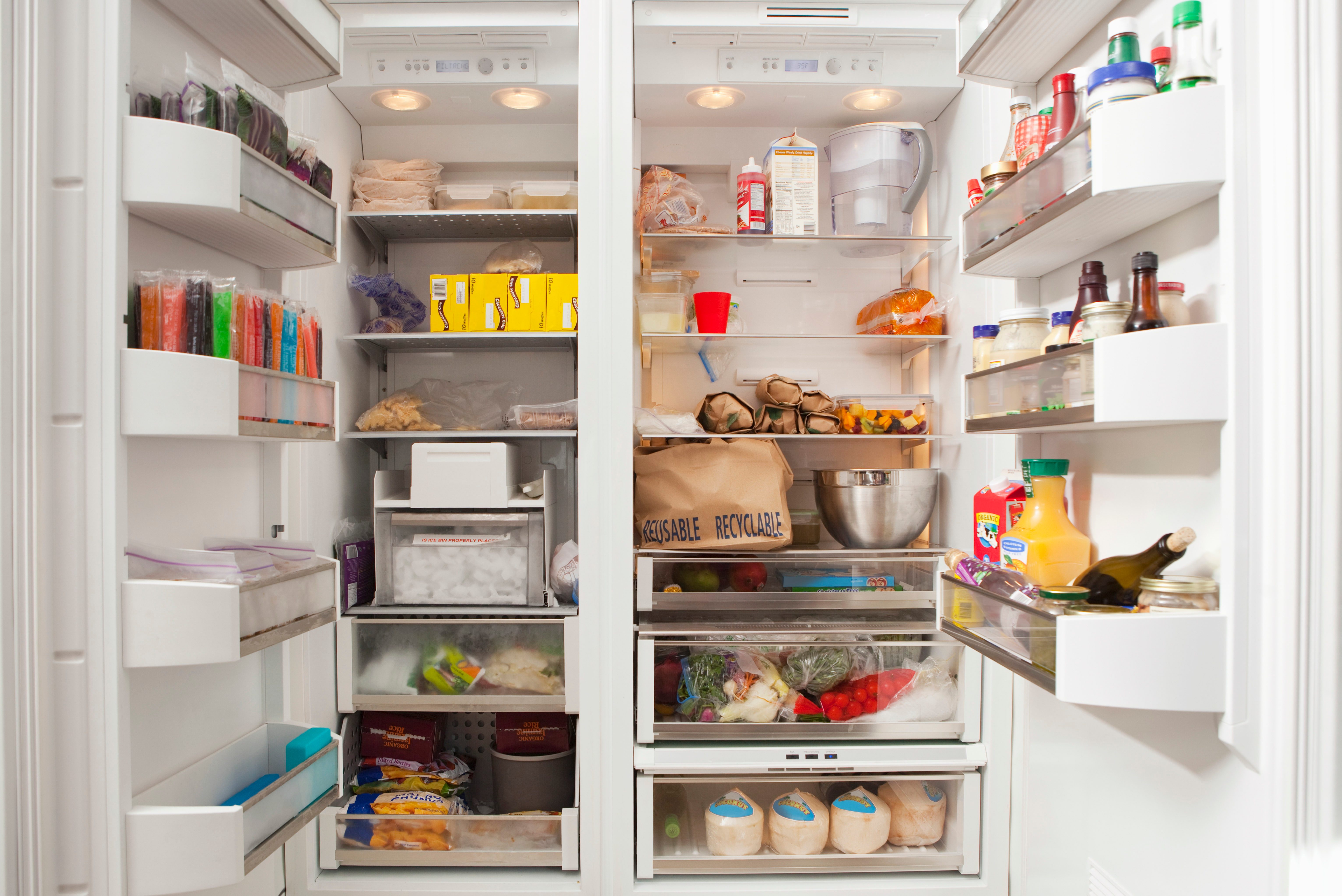 Open Refrigerator With Stocked Food Products