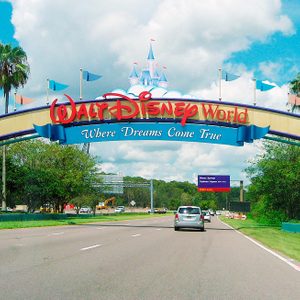 Lake Buena Vista, Florida, USA - August 19, 2015: an entrance of Walt Disney World Resort. Some cars are visible.