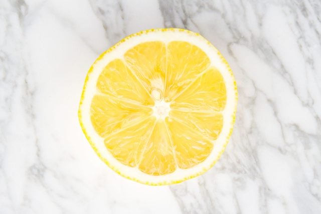 Lemon on gray marble
