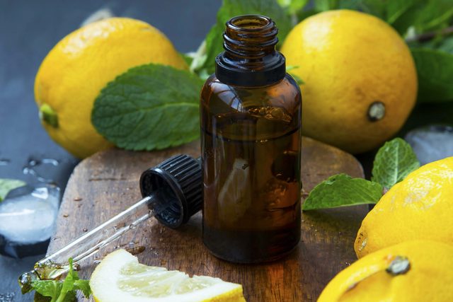 Fresh lemon essential oil, citrus and mint essence for aromatherapy