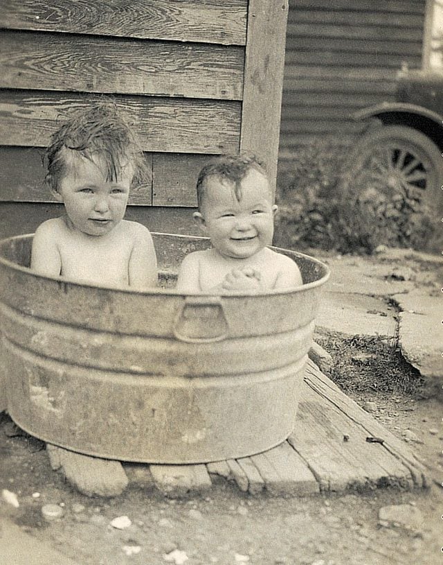 two kids in a tub