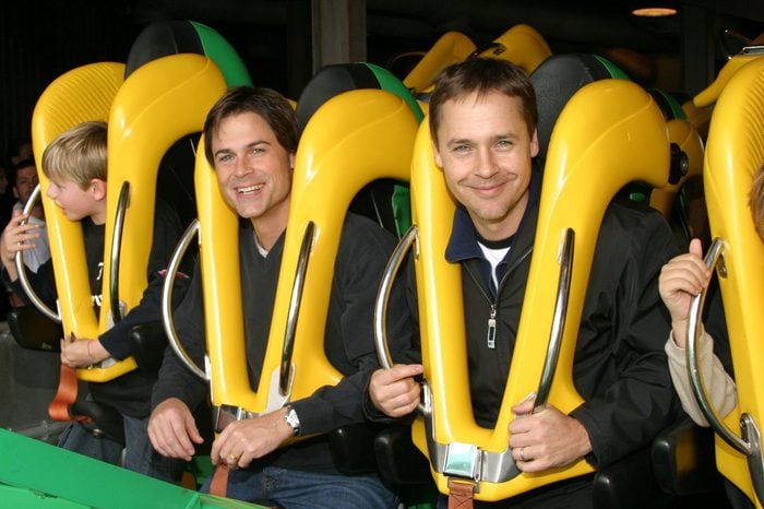 Rob and Chad Lowe ride "Riddler," at Six Flags Magic Mountain