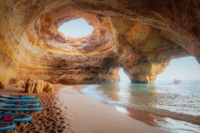 Benagil Cave, Algarve, Portugal. SUP boards and beach