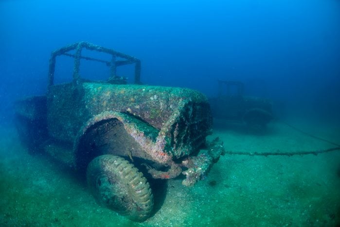 A military truck sunken as artificial reef at a dive site in Thailand