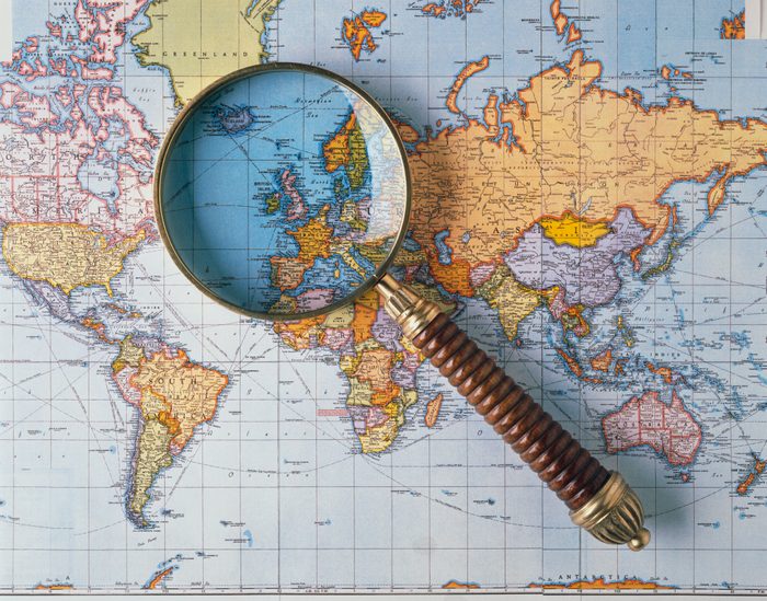 Magnifying Glass on World Map