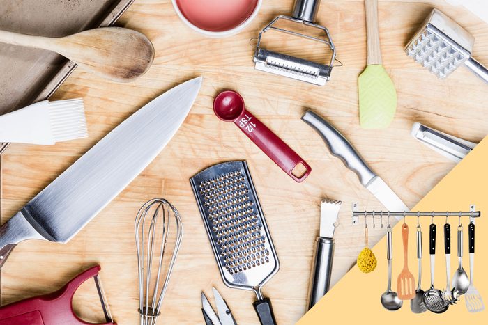 kitchen tools and utensils splayed on wood background; with suggested product