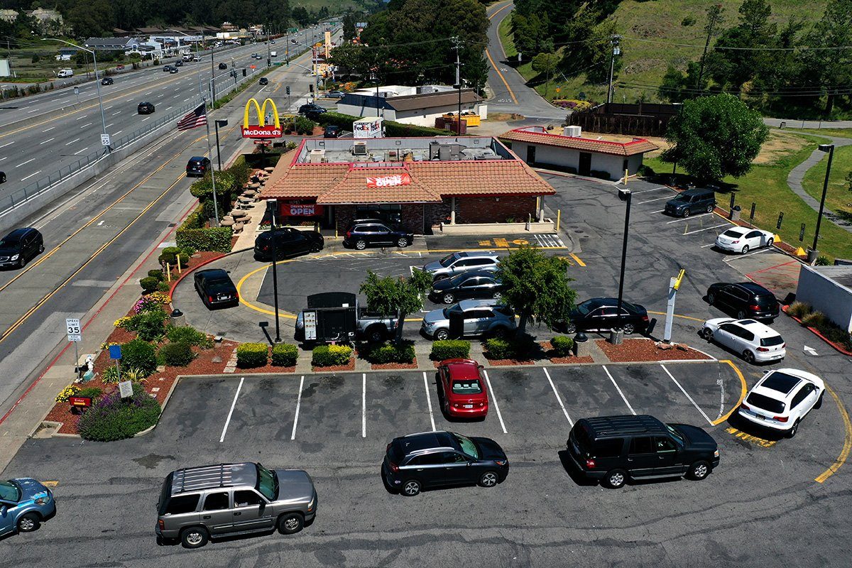 MILL VALLEY, CALIFORNIA - APRIL 22: Cars line up at a McDonald's drive-thru on April 22, 2020 in Mill Valley, California. McDonald’s announced plans to offer free Thank You Meals to first responders on the frontlines of the COVID-19 pandemic between April 22 and May 5. (Photo by Justin Sullivan/Getty Images)