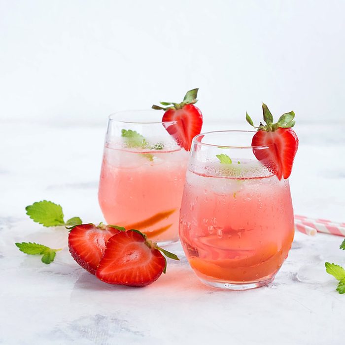Iced tea with strawberries and mint.